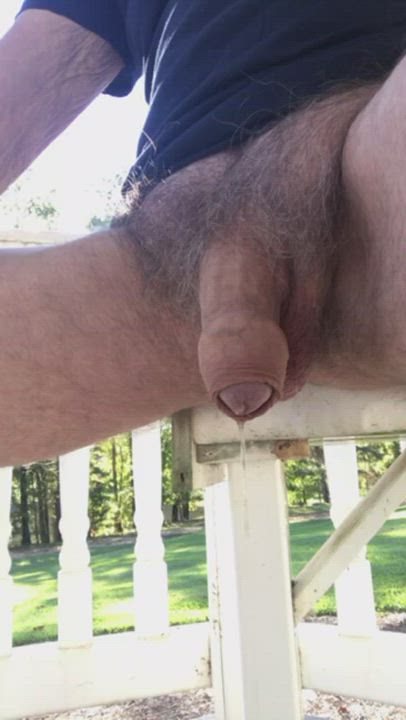 Pissing while sitting on the porch