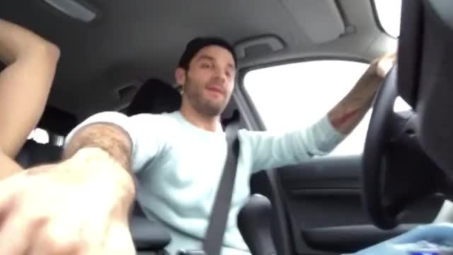 Playing with his hole while driving