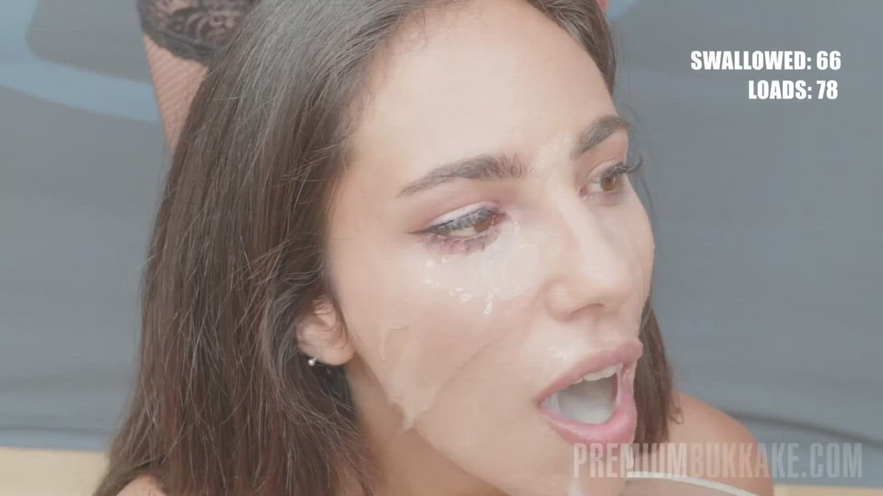 Her pretty face looks so hot covered in cum!