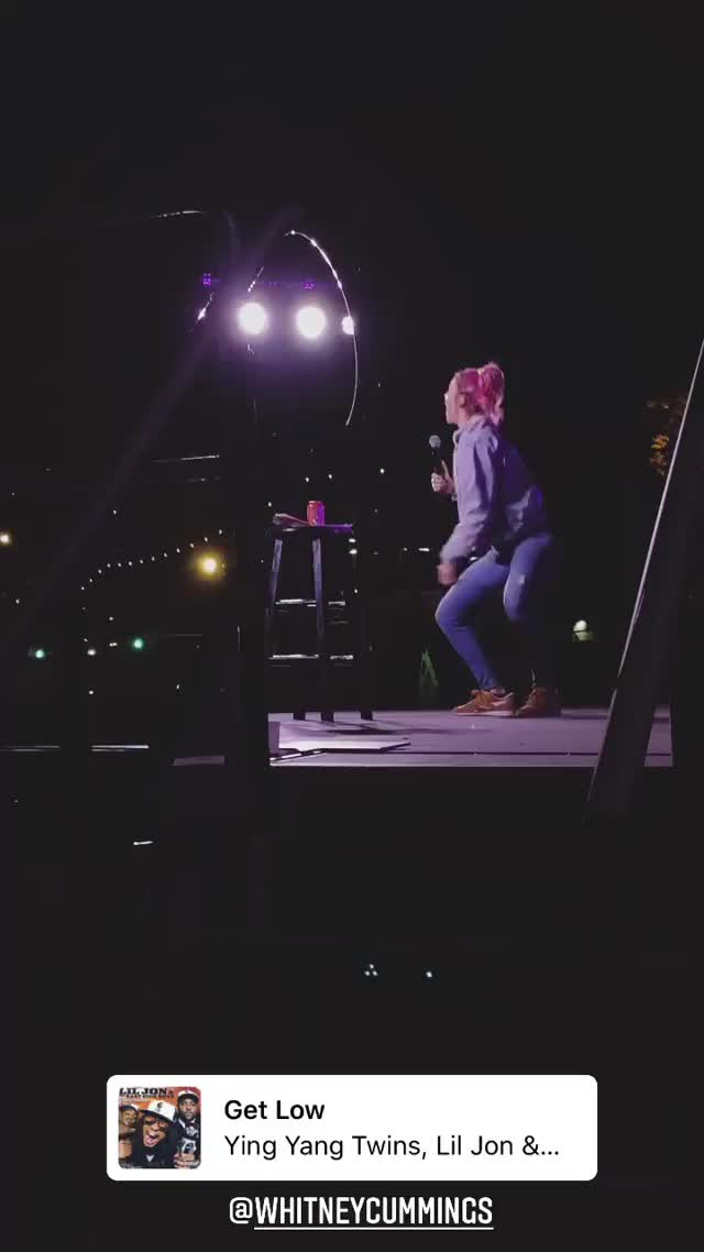 Whitney Cummings dancing on stage