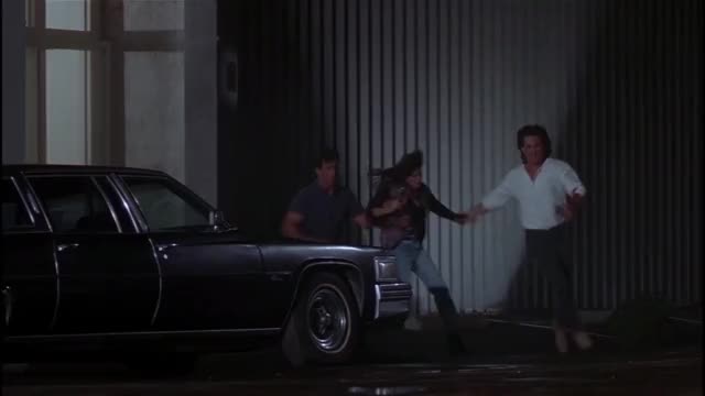 Teri Hatcher - Tango & Cash (1989) - jiggling out as she runs (slight slo-mo)
