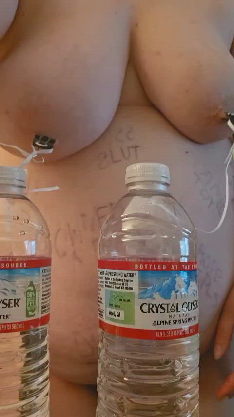 Nipple stretching with clamps and water bottles