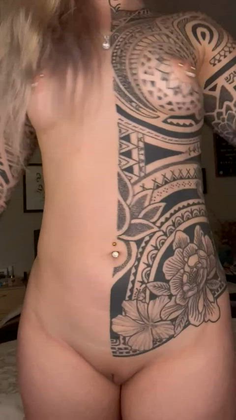 Jumping up and down with tatted tits makes for a mesmerizing combo
