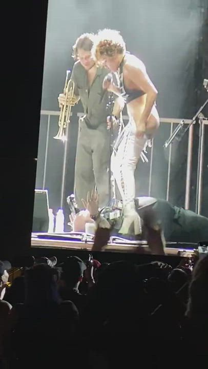 All-brass cover band singer pisses on guy's face during concert