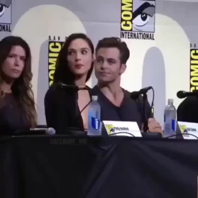 (188518) Chris Pine trying to sneak a gander at Gal Gadot's cleavage.