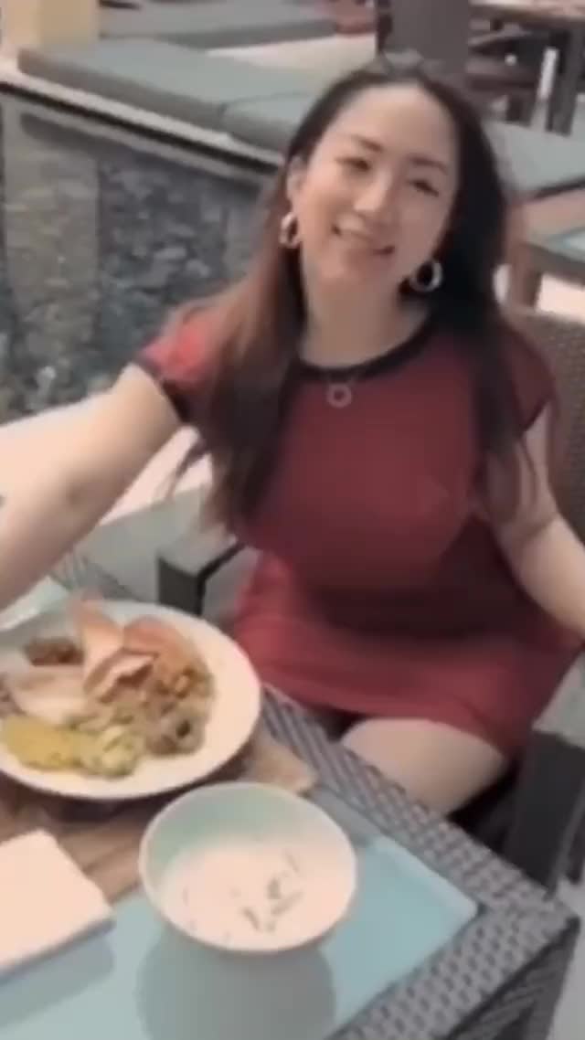 Thick Asian enjoying breakfast
