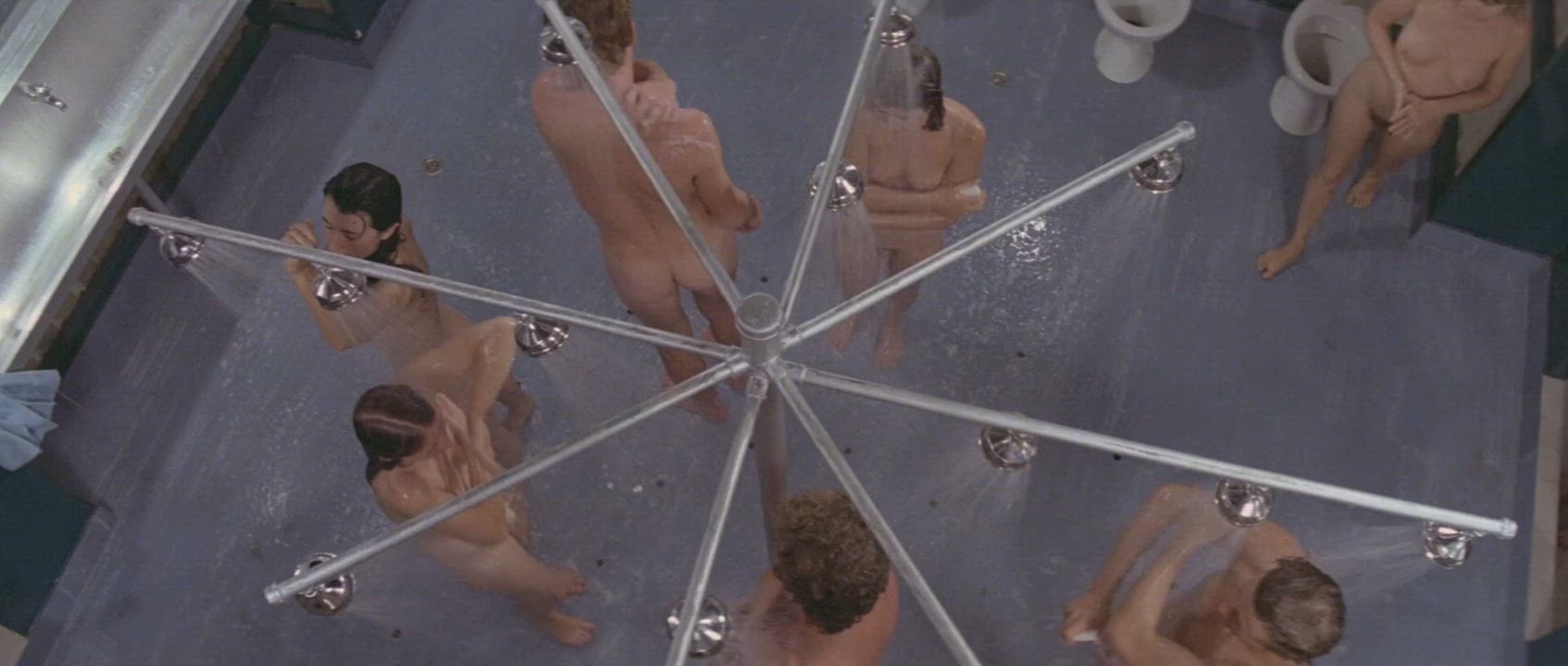 In a dystopian/totalitarian world, co-ed communal showers is very normal (Olivia