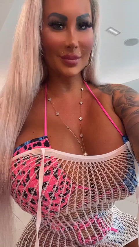 big tits blonde cleavage fake boobs fake lips fake tits huge tits jiggling tattoo