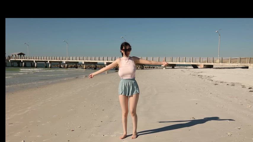 Giulia Wylde on the beach