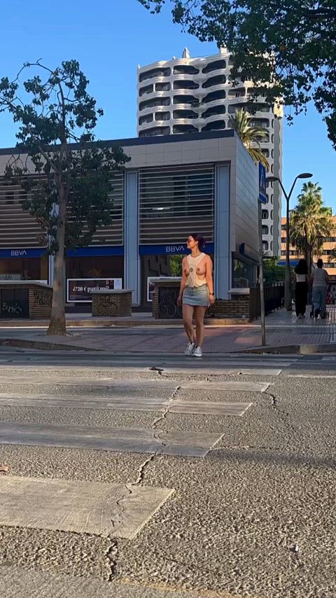 Casually crossing the street with tits out. Traffic always stops.