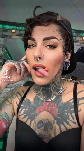 femdom fetish goddess long tongue mistress roleplay goddess short hair tattoo tongue