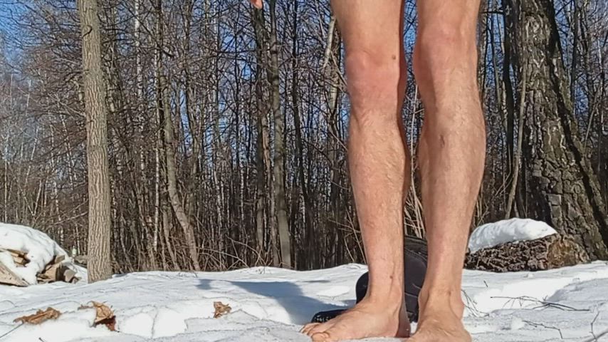 Naked barefoot in the snow