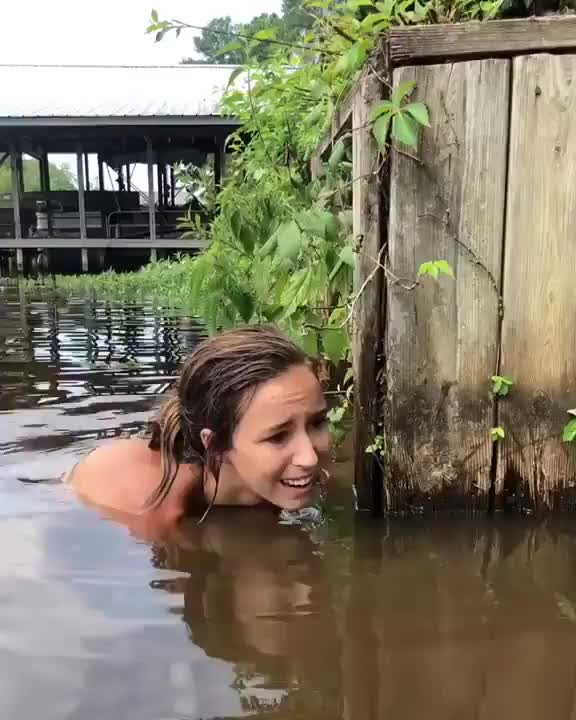 Girl Catches a Huge Catfish By Shoving her Fist Into its Gullet