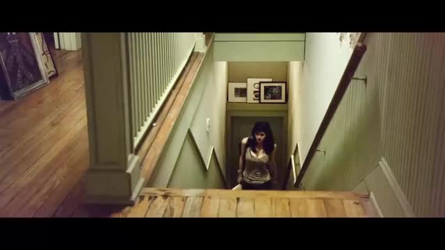 Alexandra Daddario walking up the stairs