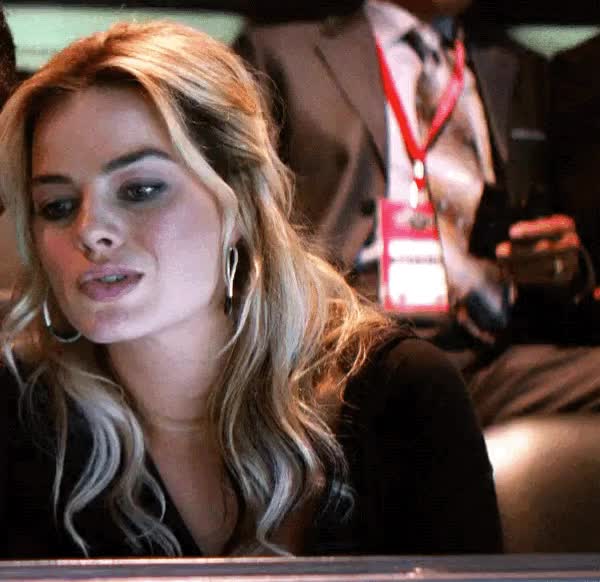 Owner’s wife in the luxury box, figuring out which player to bring home tonight...