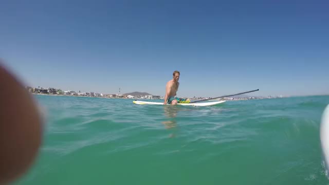 Giant squid wraps its tentacles around my paddle board!