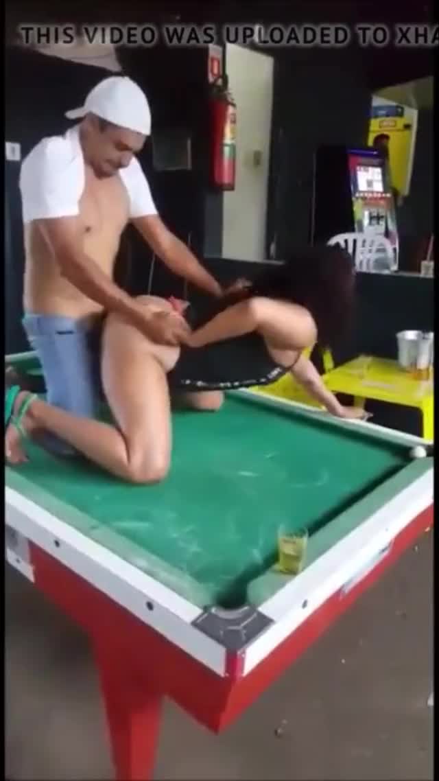 Amigo fucking on pool table at a party