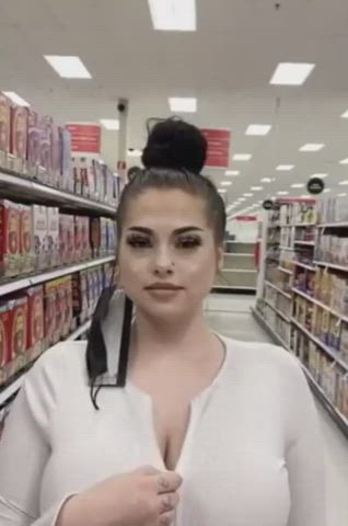 Busty girl flashing in the store