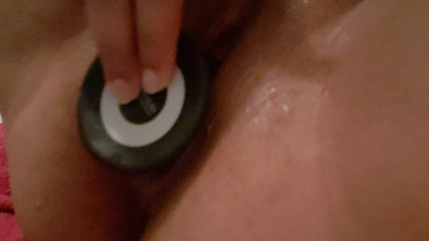 Pushing a 2.5 inch plug out my pussy. It's stretching me out so much