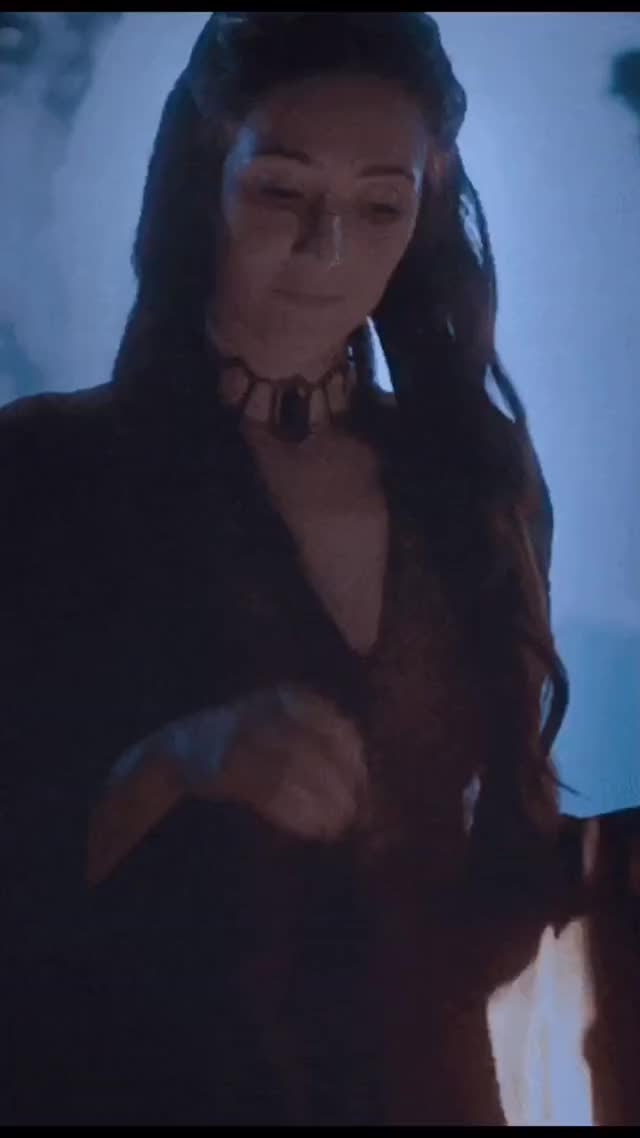 my goddess Melisandre being playful and smiling