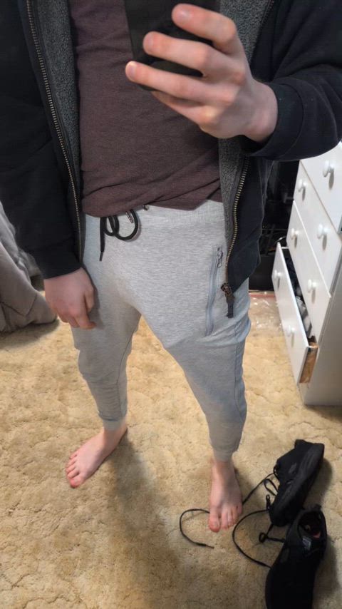 The grey sweatpants 