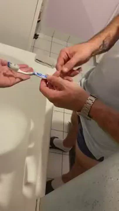 Brushing Her Teeth With Cum
