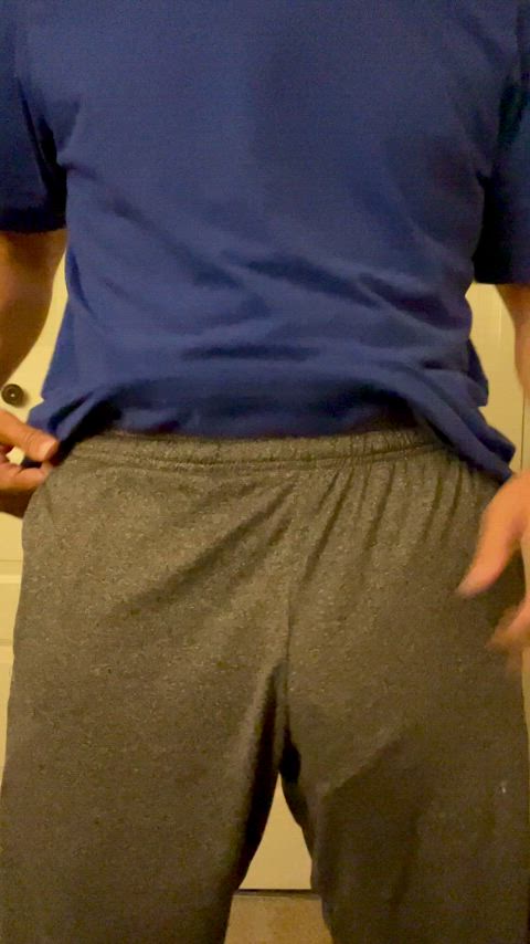 A little peak-a-boo in gray shorts 