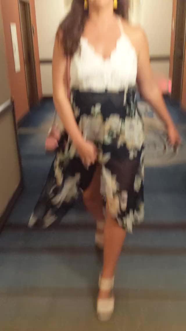 MILF wife flashing pussy outside of hotel room