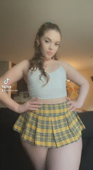 Big ass TikTok thot in miniskirt