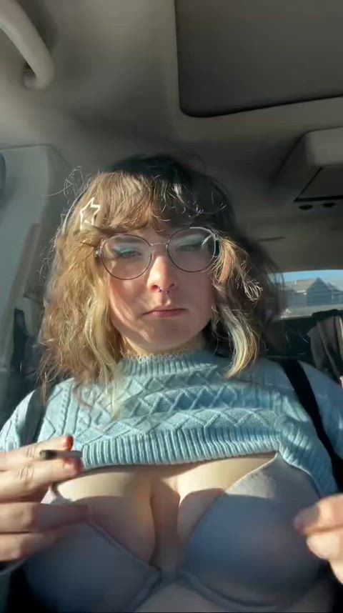 Smoking in my school parking lot and teasing my tits