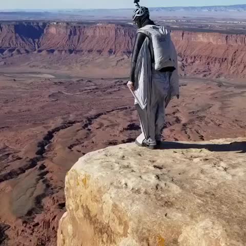 Crazy dude jumps off a canyon with a home made wing suit - da fuq