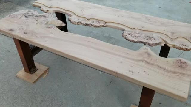 First coat of finish and placing glass on my river table