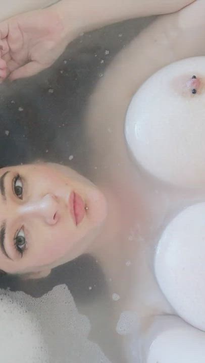 big soft tits floating in the bath
