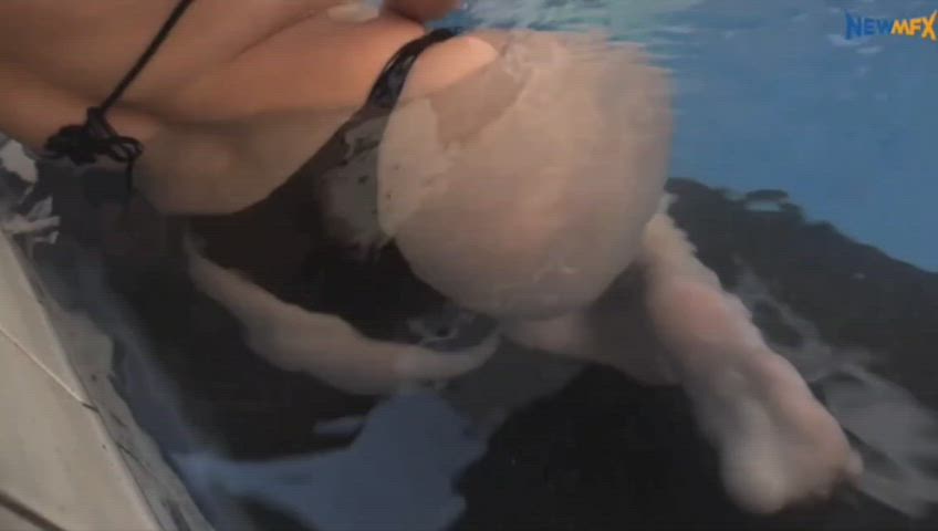 Brazilian girl making fart bubbles in Pool