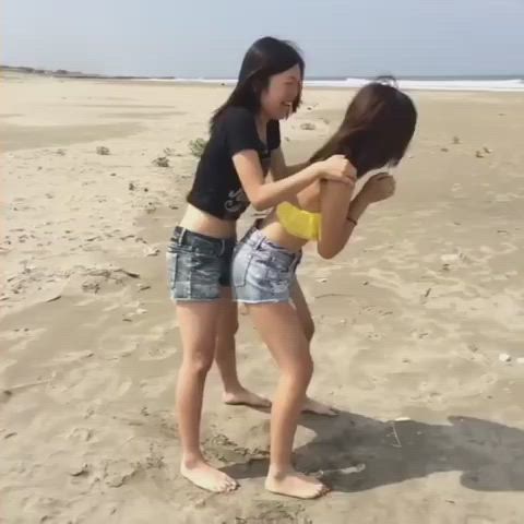 Part 1/4 of Japanese girls dry humping by the beach