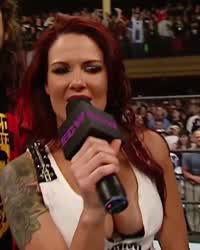 Lita never could stop showing off her big titties
