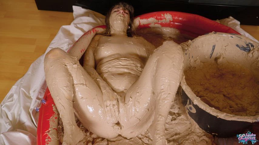 Pushing out a mud dildo