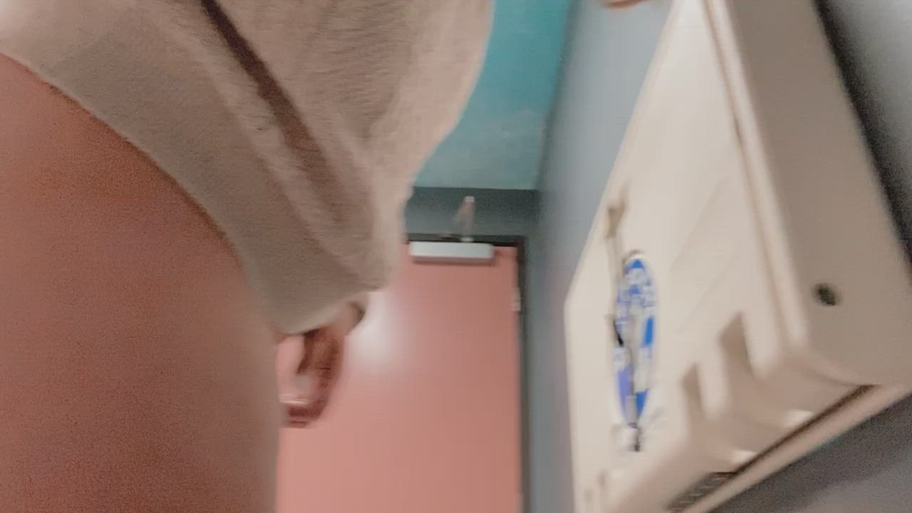 Showing off my plug in a public bathroom.