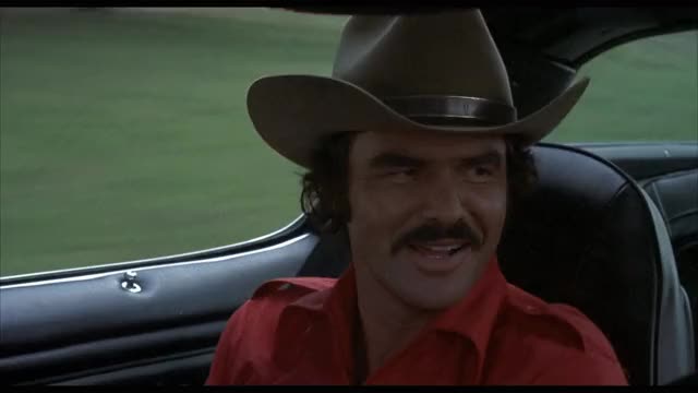 Smokey-and-the-Bandit-1977-GIF-00-47-17-reynolds-cackle