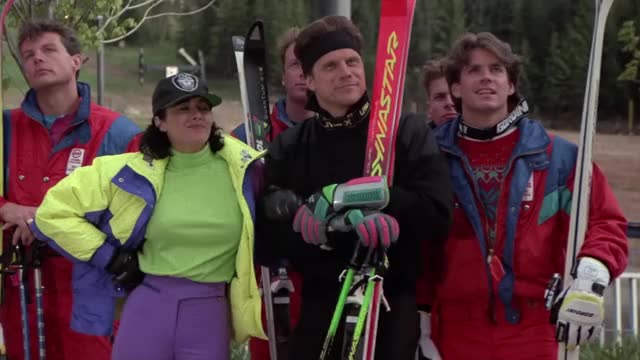 Charlie Spradling - Ski School (1990) - wearing a snug neon green shirt (pokies)