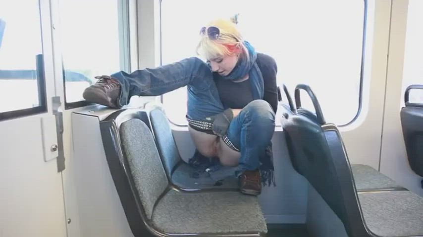 Cute Punk Rock Chick Pisses all over Public Bus Seat