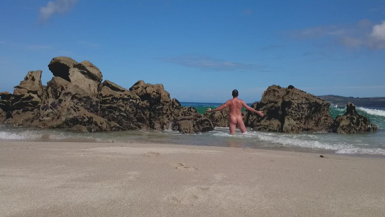Shower time. Beach nude freedom