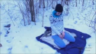 Dirty girl masturbates in winter forest