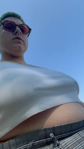 Tits bouncing while riding the mower