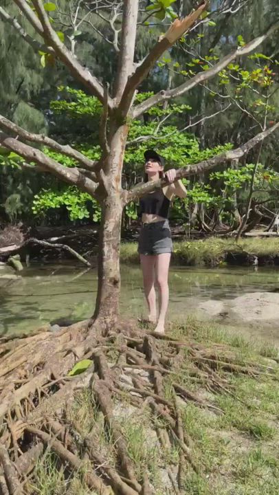 Natalie climbing a tree