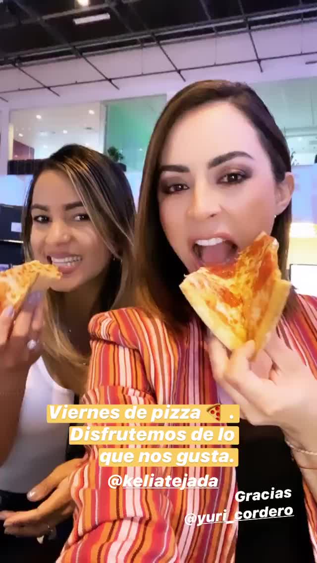 Carolina Rosario Eating Pizza