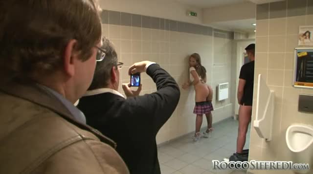 in the men's bathroom with onlookers AVN: adult video awards