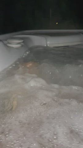 Playing with my pierced cock in the hot tub