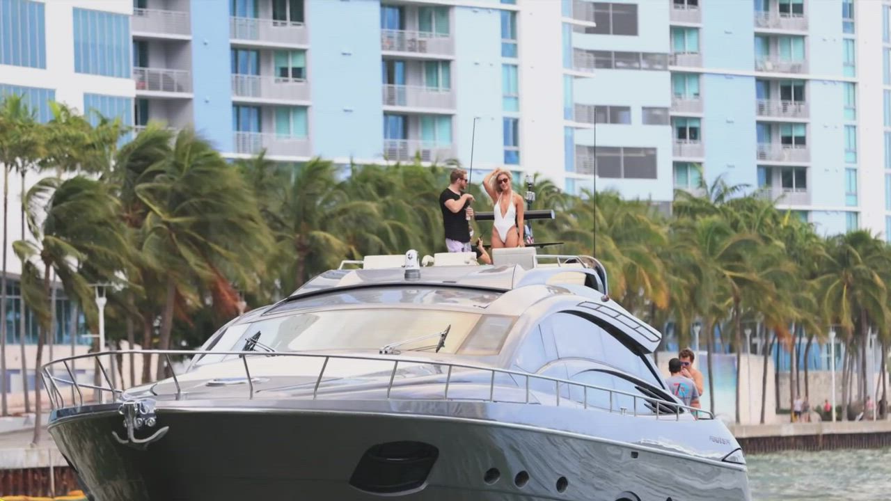 The boat and the girl are a match! Such a nice one-piece...