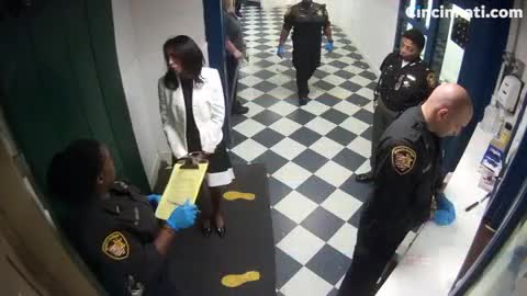 Tracie Hunter being processed inside Hamilton Co. Justice Center